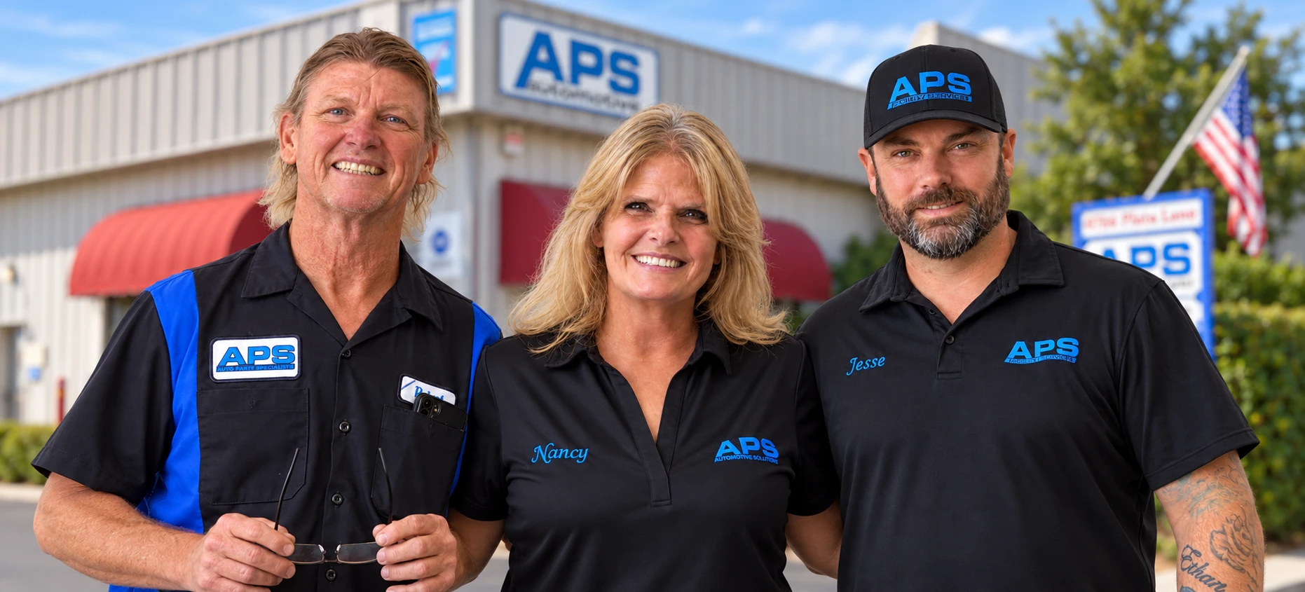 Three APS Automotive technicians in the shop